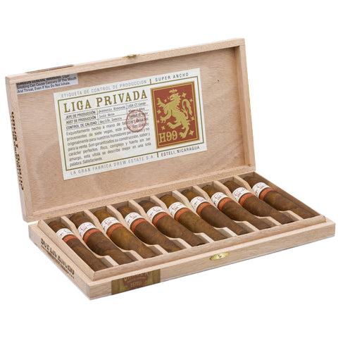 Open wooden humidor with cigars and Liga Privada label on a white background